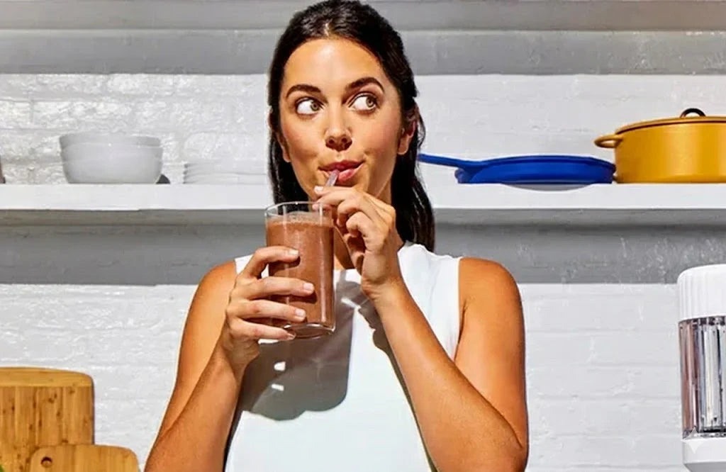 Woman drinking a Happy Viking shake